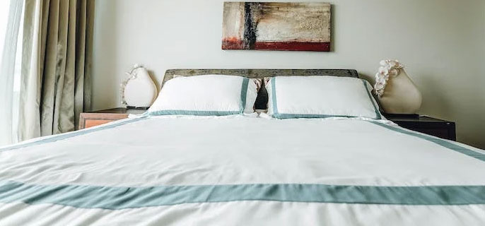 冬天蓋蠶絲被好還是羽絨被好